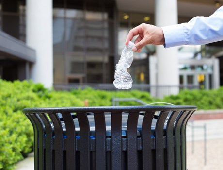 Office staff logging a complaint about bin collection services