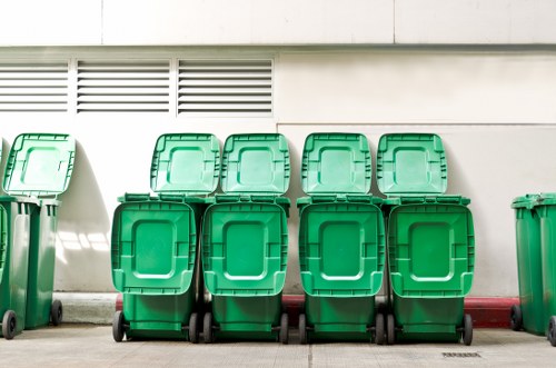 Professional waste management team sorting construction waste