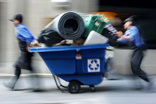 Workers wearing PPE during waste handling